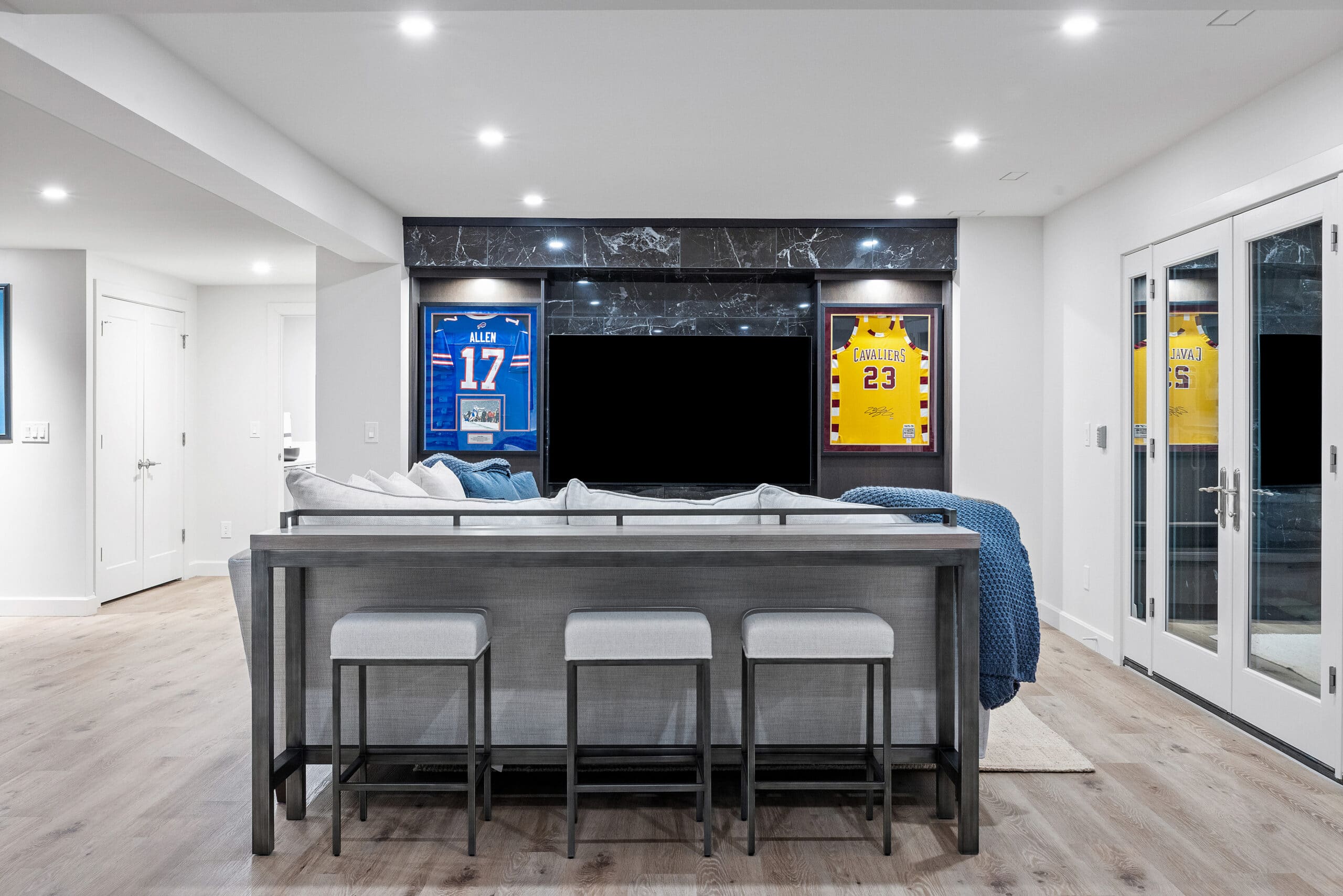 Elegant white kitchen in spacious aging-in-place house.